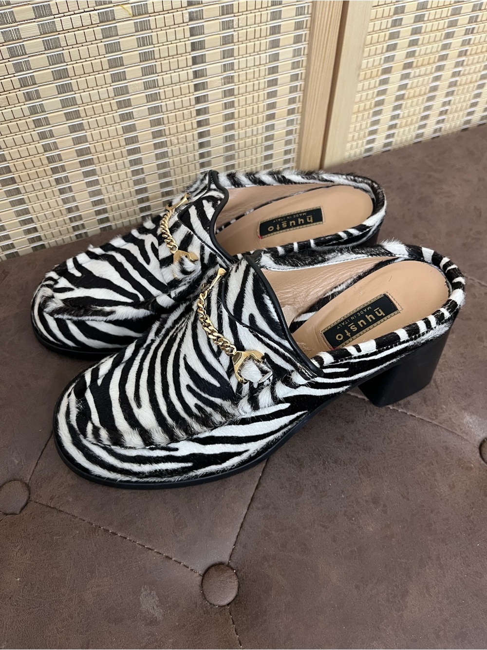 Hyusto zebra-print Janet pony hair loafers with gold horse-bit chain